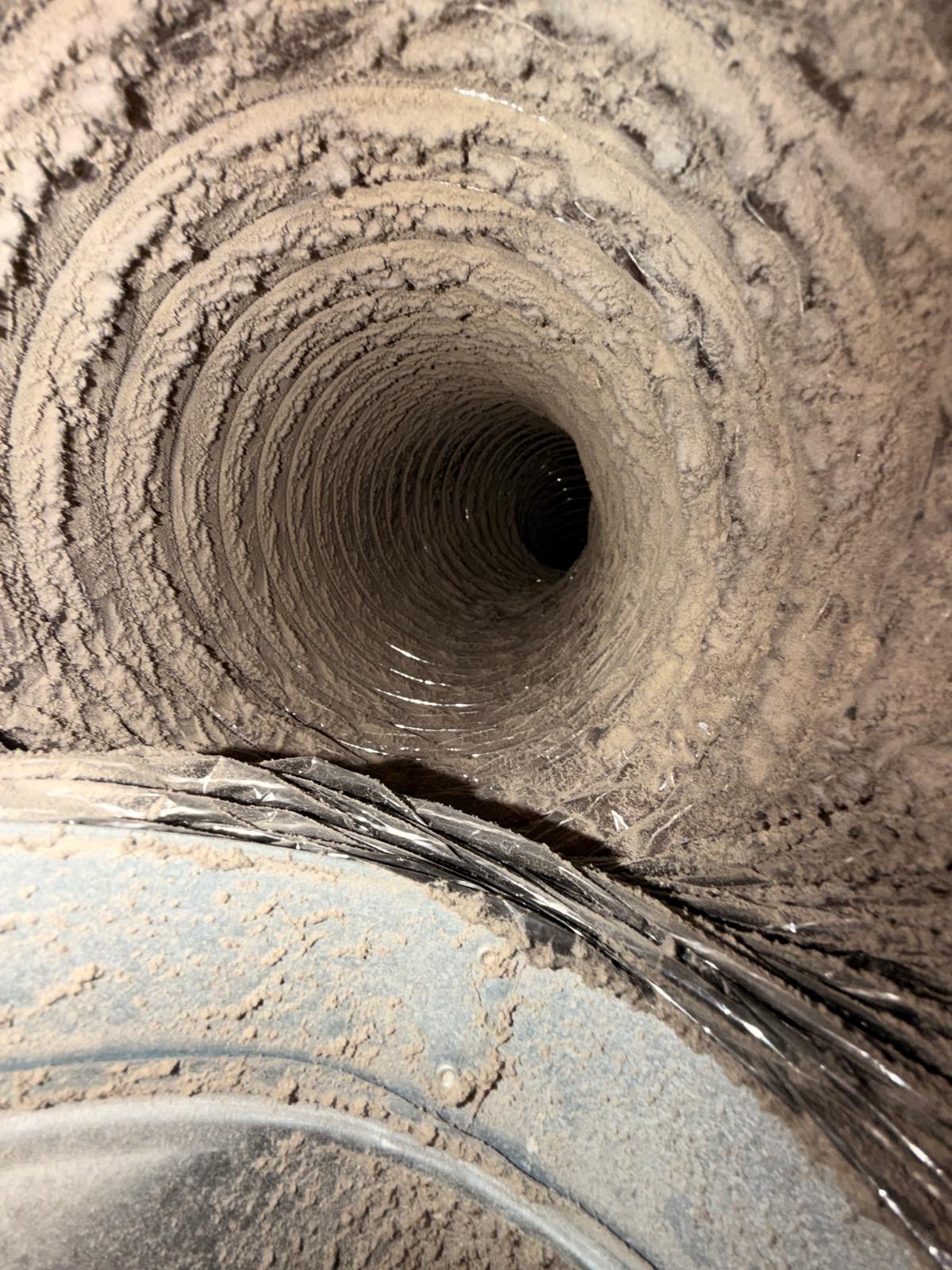 Dryer vent cleaning service in a Kennesaw, GA laundry room
